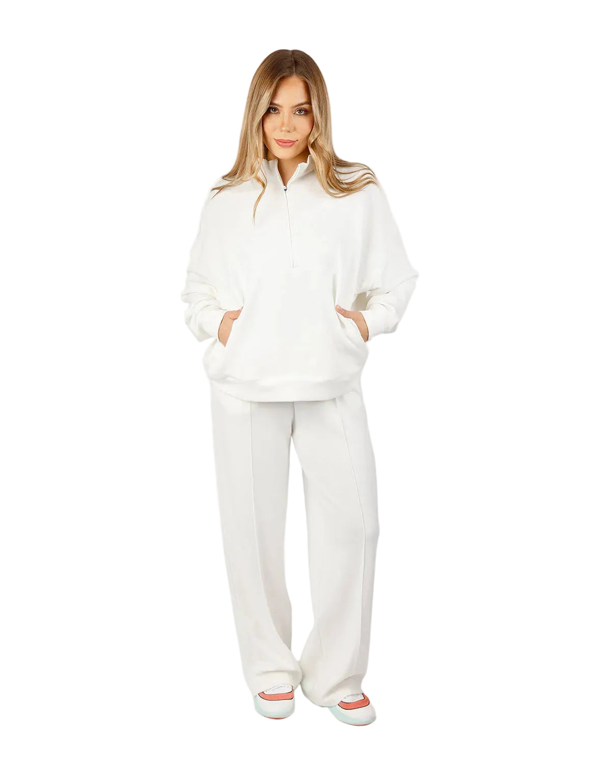 Woman wearing a white tracksuit on a white background